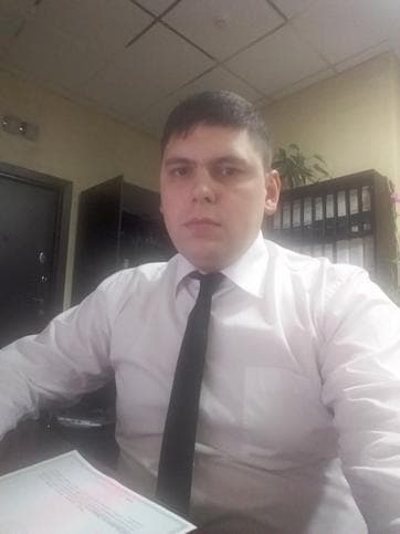 Александр Белан